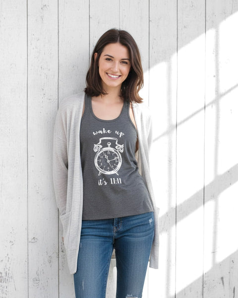 Woman wearing a dark gray 11:11 angel number clock tank top with a vintage, distressed look.